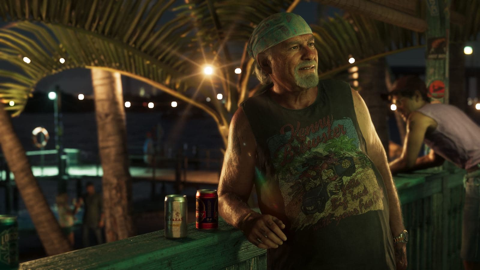 Brian Heder in a bandana and sleeveless shirt, leaning on a waterside railing at night with two cans beside him