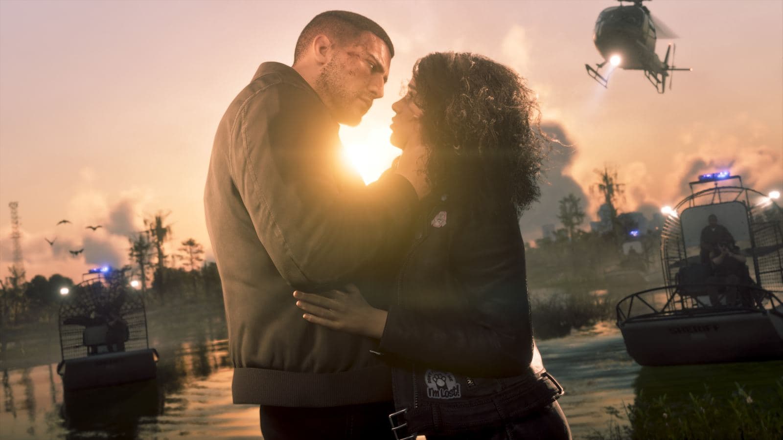 Jason and Lucia embrace at sunset in the wetlands as police airboats and a helicopter close in