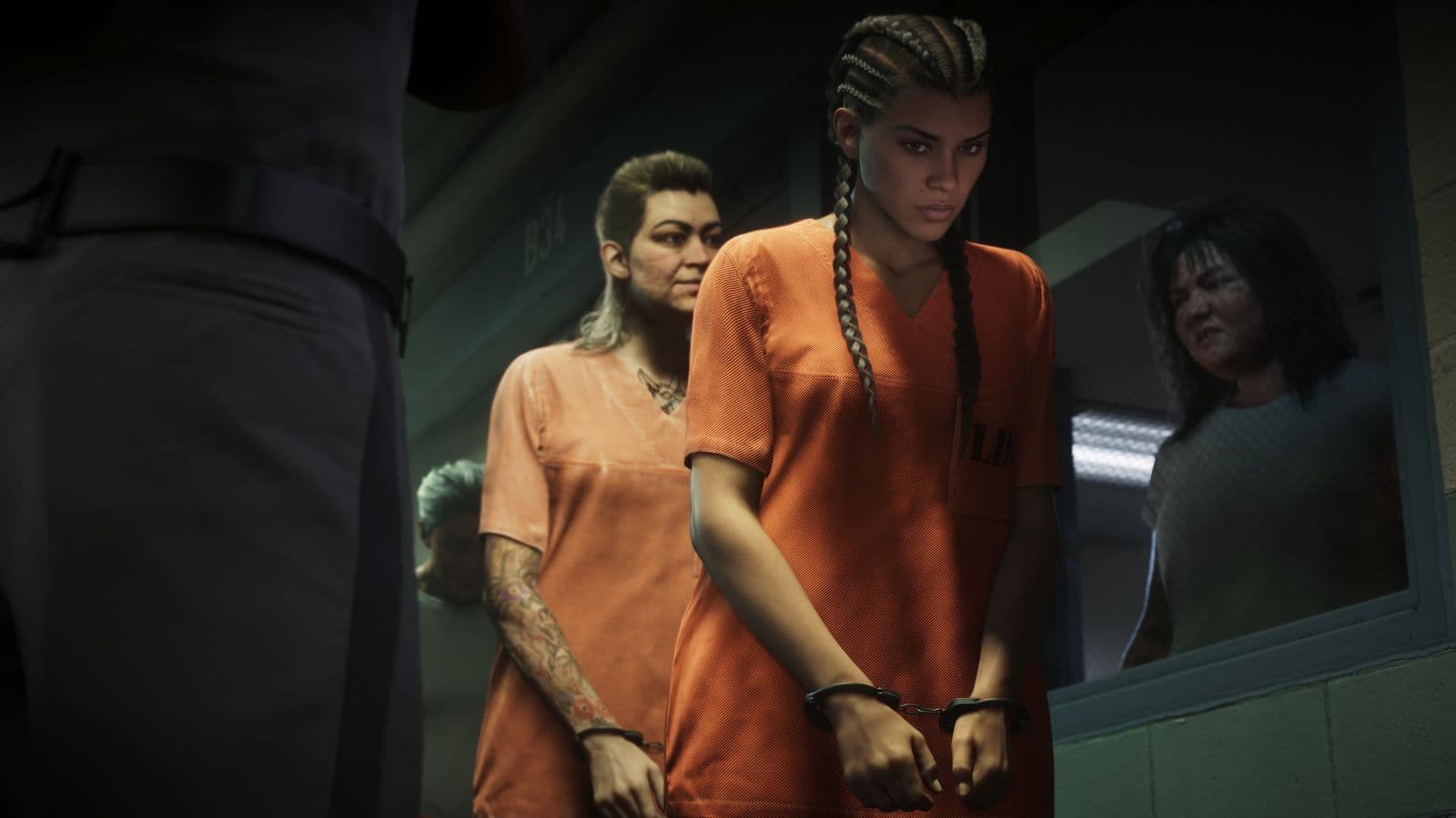 Lucia Caminos in an orange prison jumpsuit and handcuffs, lined up with other inmates