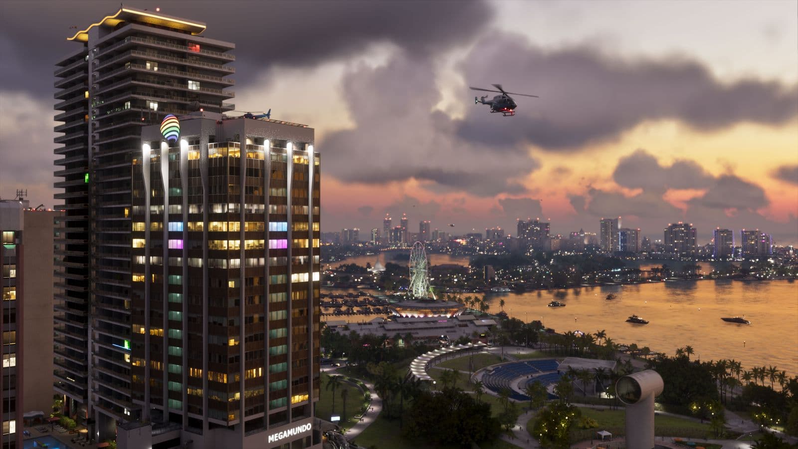 The Vice City skyline and bay at dusk, with a helicopter passing a lit tower